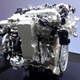 Supercharger on the side with integrated liquid-to-air intercooler.
